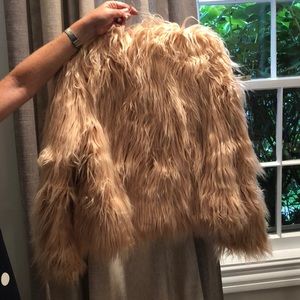 Never been worn faux fur jacket.